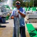 A crew member holds one of our Wahoo!
